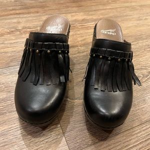 Dansko fringe clogs